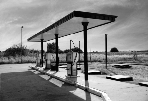 A black and white photos gas pumps